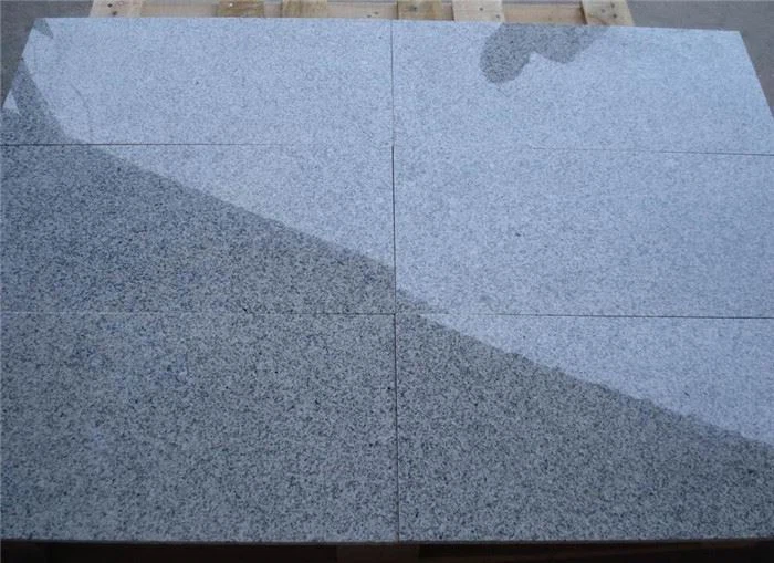 Luna white granite tiles polished